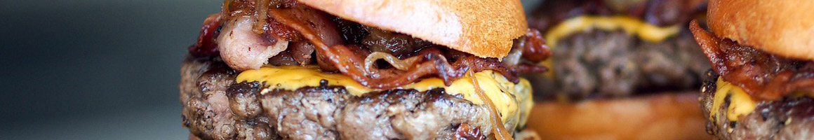 Eating Burger at Polk-A-Dot Drive In restaurant in Braidwood, IL.